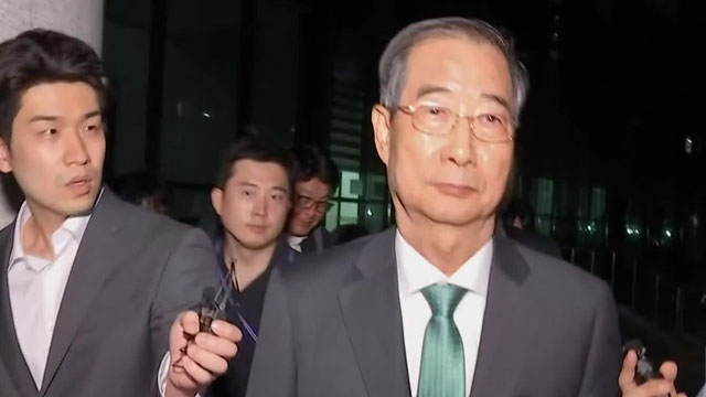 한덕수, ‘내란 특검’ 소환 14시간 만에 귀가…<br>안덕근·유상임 장관도 조사